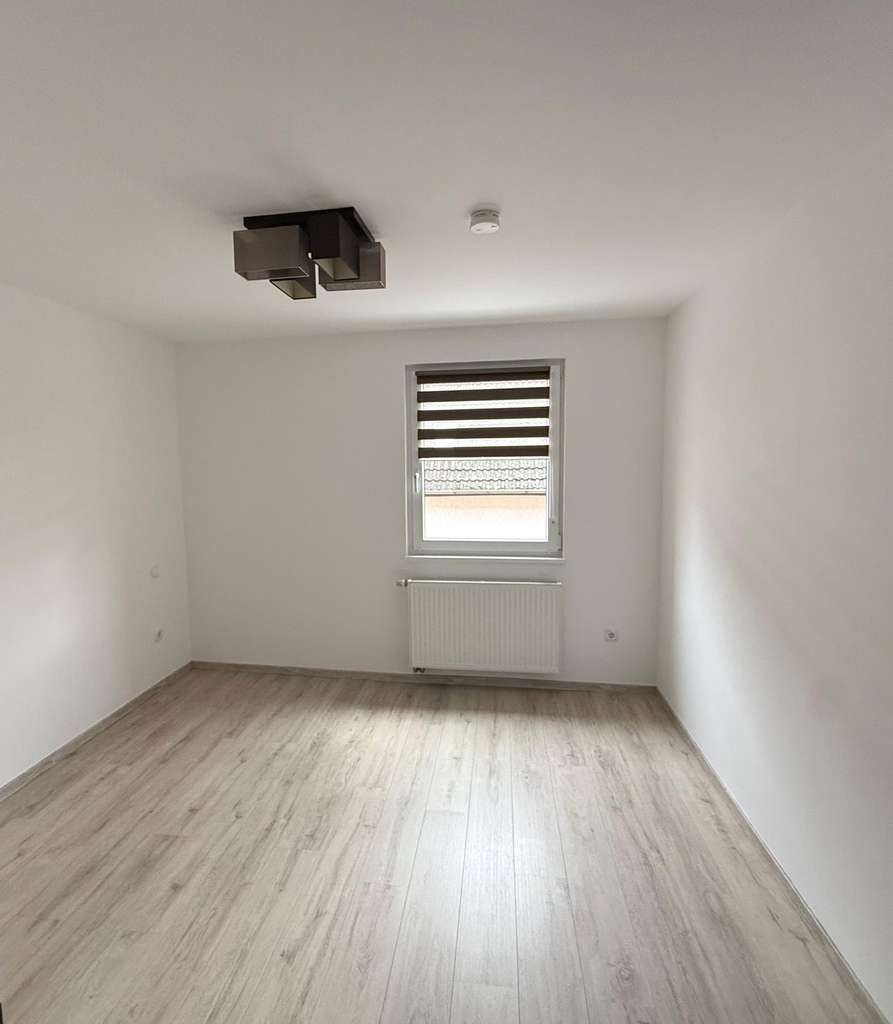 Immobilie in Lustadt - Attraktive 3-Zimmer Wohnung mit Balkon und Gartenanteil - Bild 4