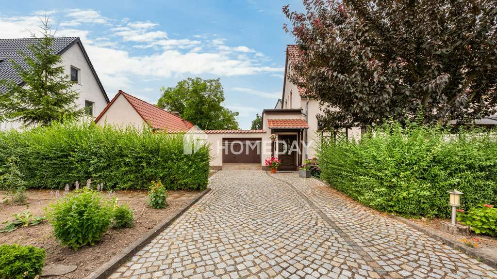 Immobilie in Wurzen - Idyllische Wohnqualität mit Garage, Garten, überdachter Südterrasse, Nebengebäude & Raumvielfalt - Bild 2