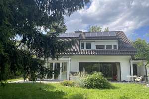 Einfamilienhaus mit großem Naturgrundstück in ruhiger Münchner Lage