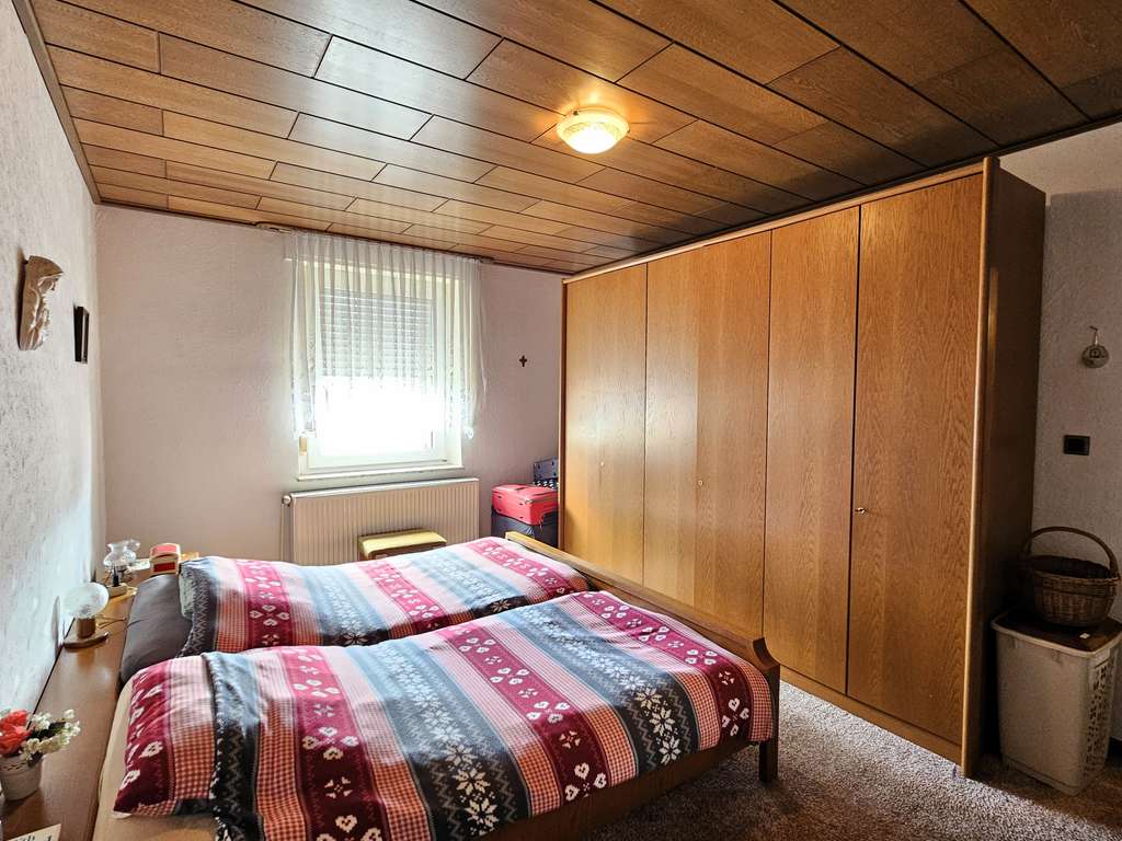 Immobilie in Geseke - Geseke: Mehrfamilienhaus mit modernisierten Wohnungen & Potenzial - Bild 3