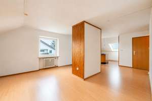 AIGNER - Mitten im Westend: Helle Dachgeschosswohnung mit offenem Wohnkonzept – 80686 Friedenheim, München – Vorschaubild 2
