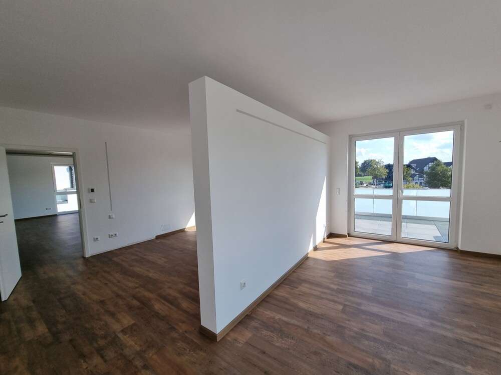 Immobilie in Lembruch - Wohnen, da wo andere Urlaub machen! KfW 55 Effizienzhaus - Penthouse-Eigentumswohnung mit großer Dac - Bild 3