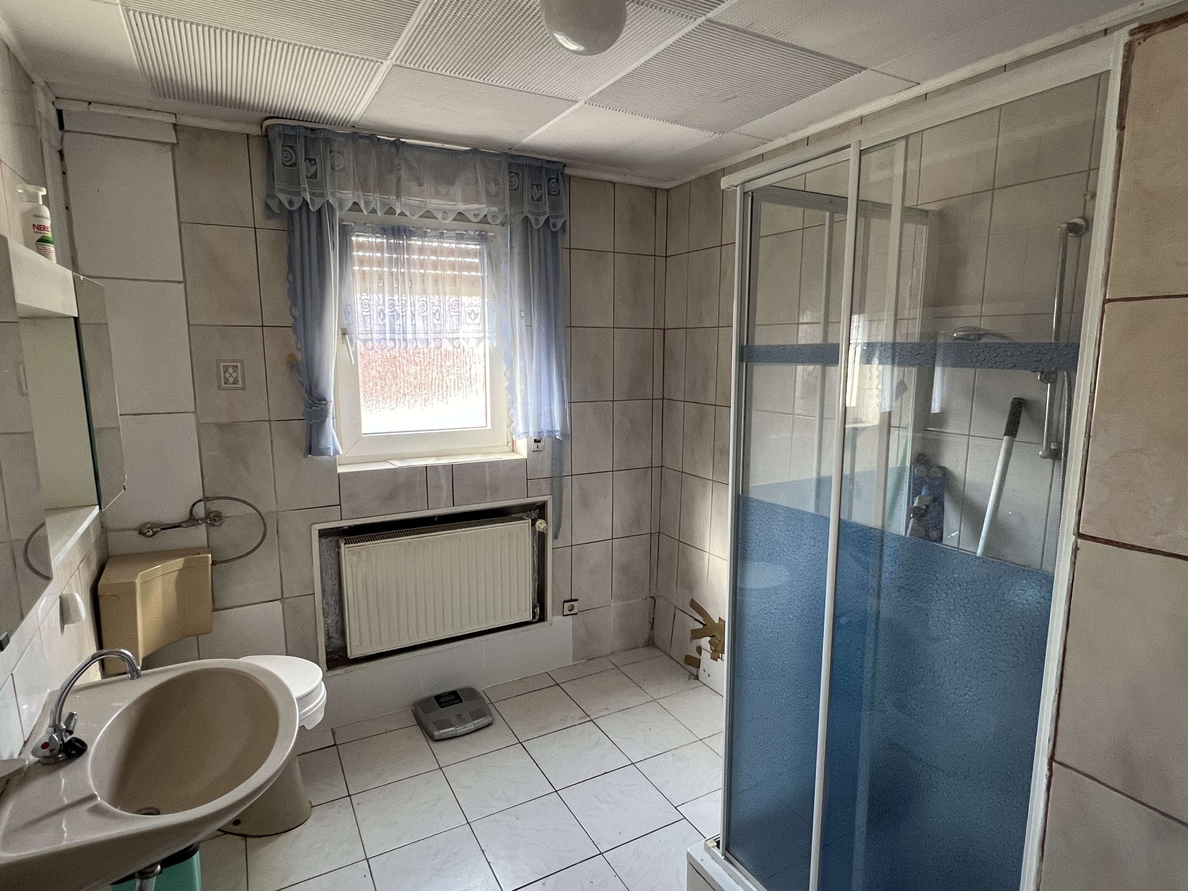 Immobilie in Langenselbold - Sanierungsbedürftiges Mehrfamilienhaus in Langenselbold - Bild 2