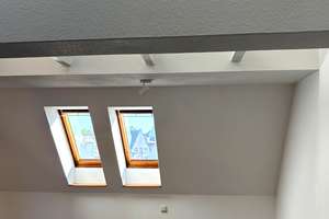 Loftartige Dachgeschosswohnung mit Galerie und Blick über Augsburgs Dächer