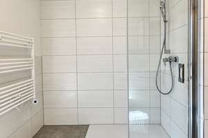 Stilvoll wohnen in Moosach: moderne 3-Zimmer-Neubauwohnung mit großem Sonnenbalkon & TG-Stellplatz – 80992 Alt-Moosach, München – Vorschaubild 9