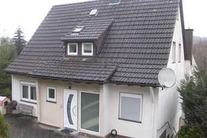 Einfamilienhaus mit Baugrundstück und Sauna in Eiserfeld