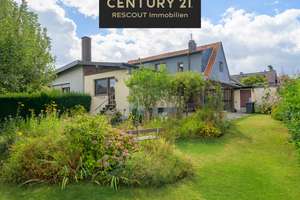 C21- Ziegelrot trifft Gartengrün - Doppelhaushälfte mit Potenzial!