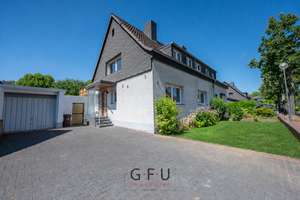 Moderne Doppelhaushälfte mit herrlichem Garten  in familiengerechter Wohnlage
