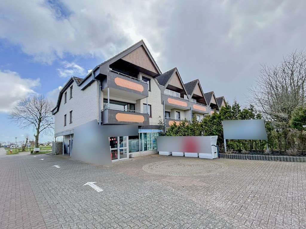 Immobilie in Westerdeichstrich - Ihr Rückzugsort an der Nordsee - Charmante 2-Zimmer-Wohnung nahe Büsum mit Stellplatz und Balkon - Bild 1
