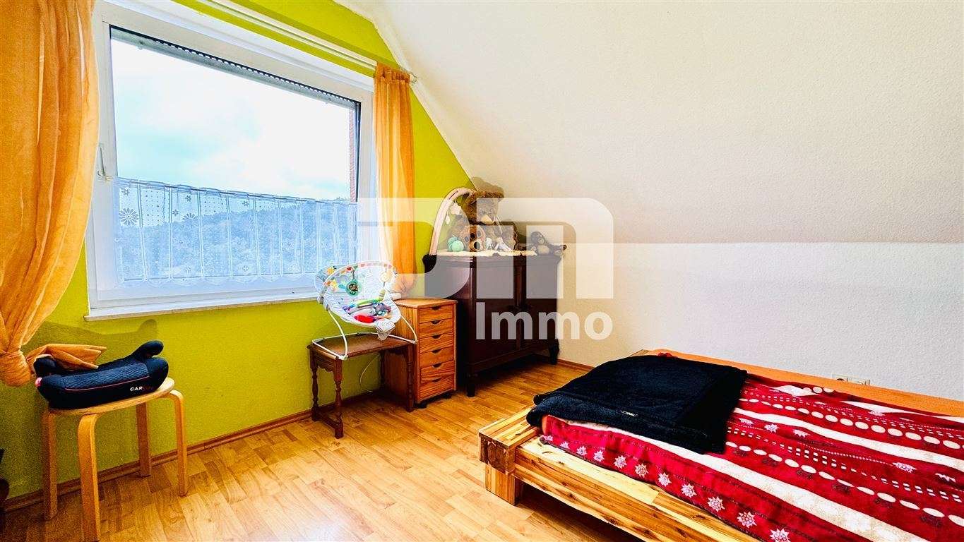 Immobilie in Bad Karlshafen - Modernisiertes Einfamilienhaus mit Einliegerwohnung, Wintergarten, Sauna und 2 Garagen - Bild 6