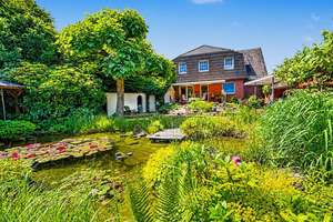Wohnen wie im eigenen Park – Traumhaus mit Einliegerwohnung und Baureserve von Ibbenbüren – Die vollständige Adresse der Immobilie erhältst du vom Anbieter., 49477 Ibbenbüren – Vorschaubild 2