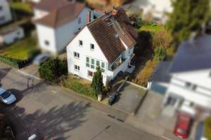 3-Parteien-MFH in ruhiger Sackgasse – EG-Wohnung aktuell frei!