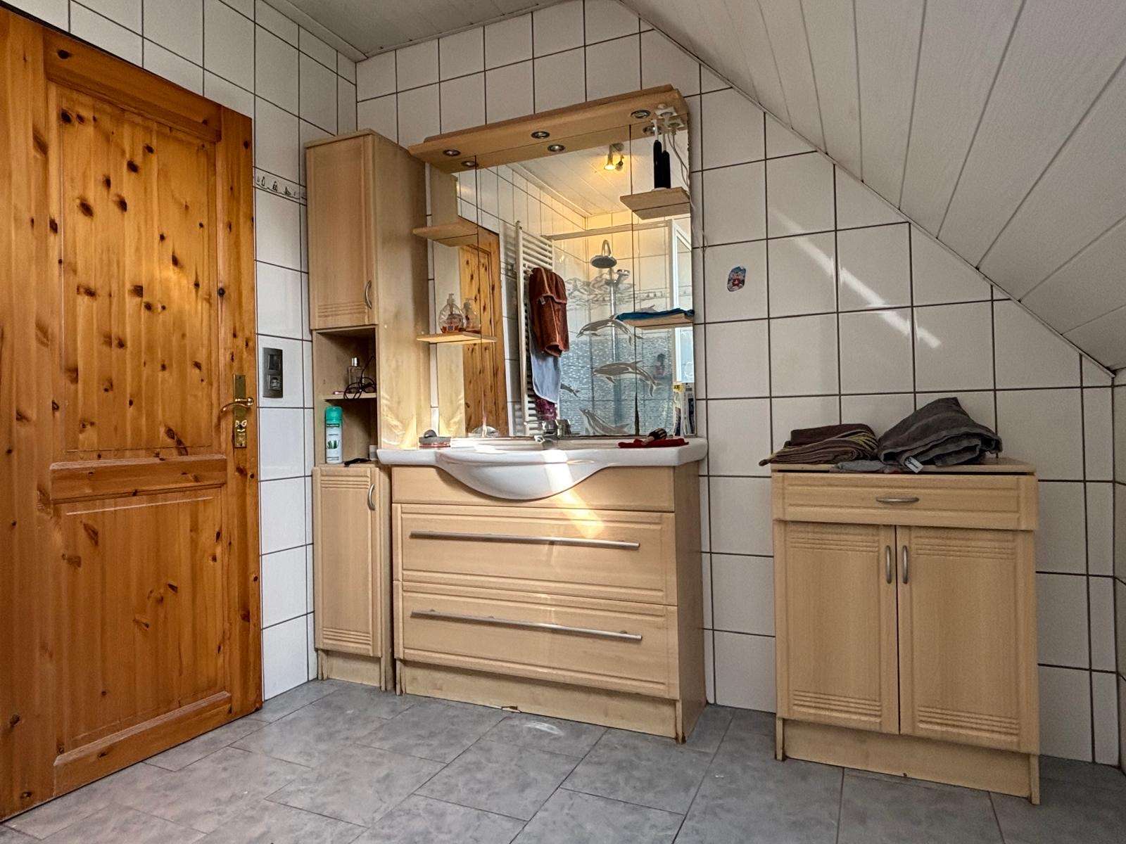 Immobilie in Großheide - Einfamilienhaus mit Einliegerwohnung in Sackgassenlage - Bild 11