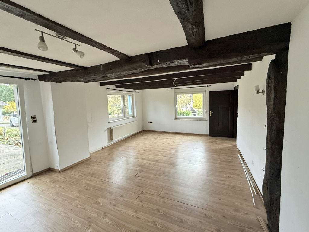 Immobilie in Waldbröl - Charmante Fachwerk-Doppelhaushälfte mit großem Grundstück und Garage - Bild 4