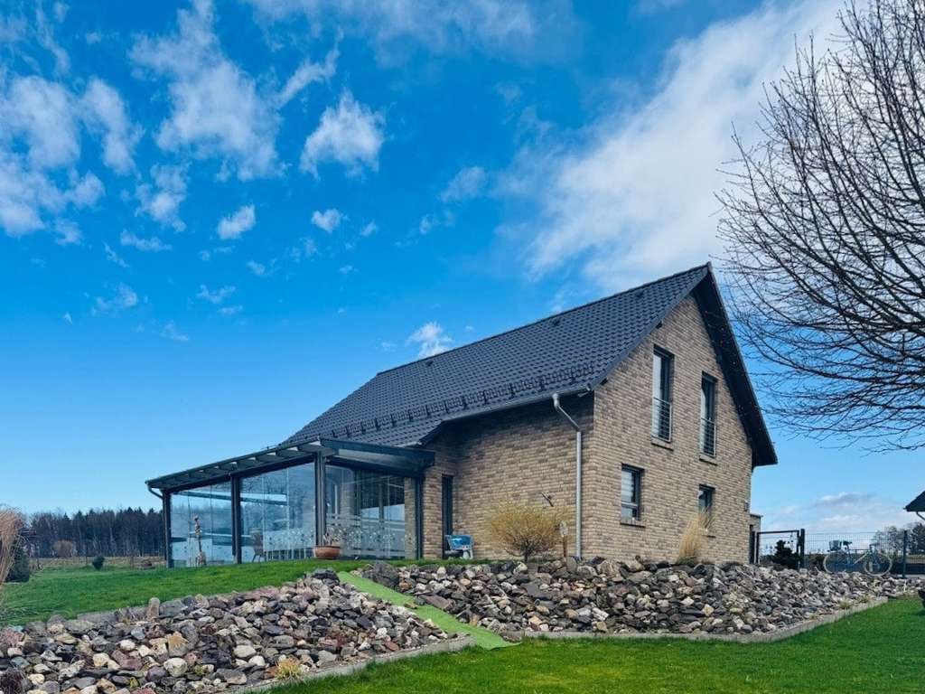 Immobilie in Rüscheid - Neuwertiges Einfamilienhaus in ruhiger und naturverbundener Lage - Bild 1