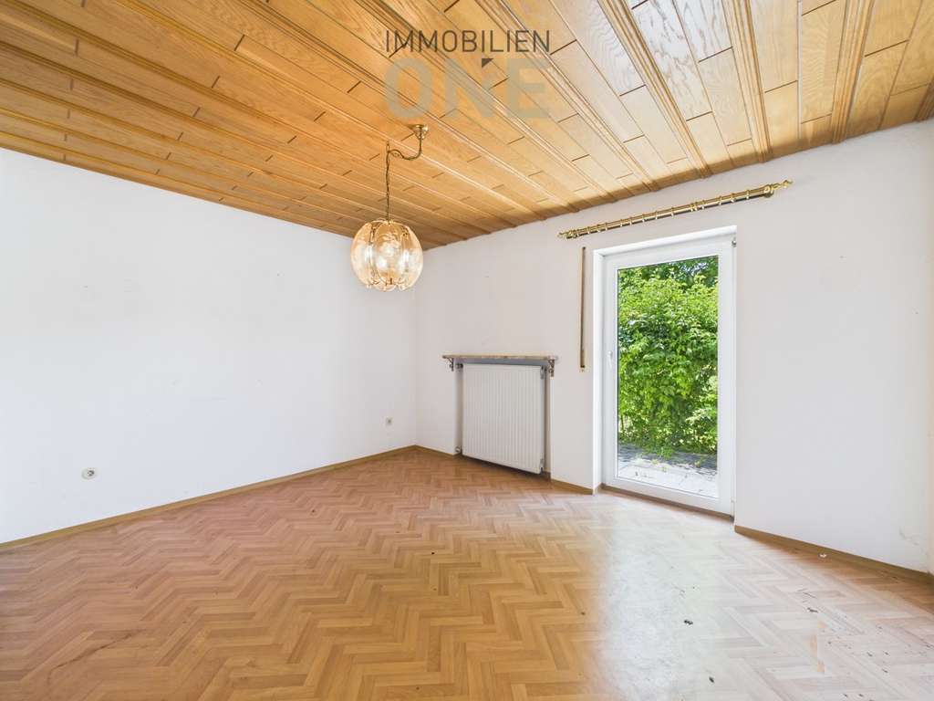 Immobilie in Nittendorf - 4-Zimmer Hochparterrewohnung mit Südterrasse und Garage - Bild 1