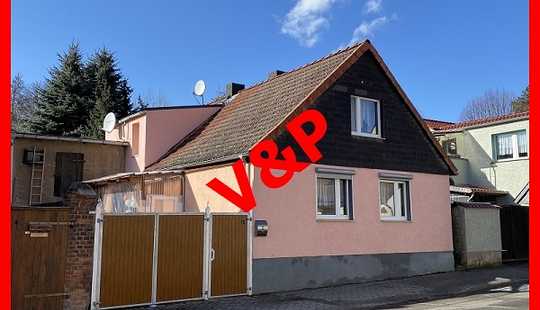 Bild von Einfamilienhaus auf kleinem Grundstück mit Nebengelass