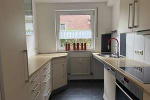 Wohnen mit Komfort: 2- Zimmer- Erdgeschosswohnung mit Terrasse und Einbauküche