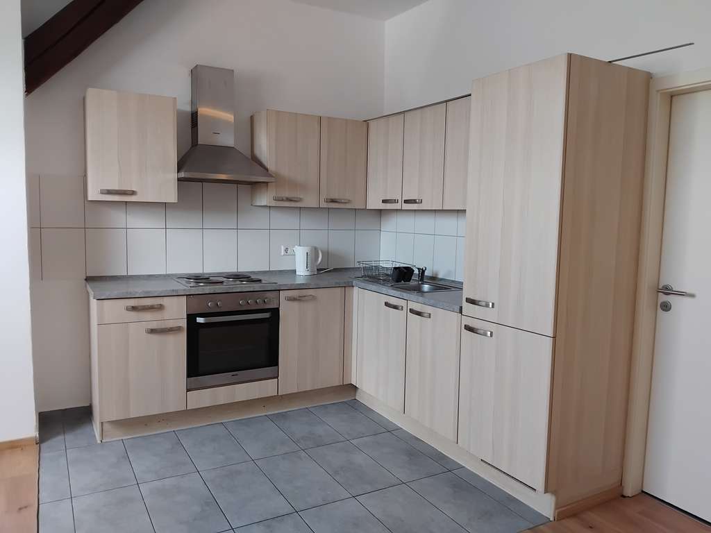 Immobilie in Laupheim - STADTZENTRUM LAUPHEIM! Gemütliche 3 Zimmer - DG- Wohnung mit EBK und Stellplatz, zu verkaufen! - Bild 0