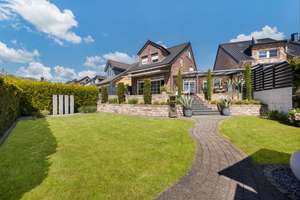Familienparadies - Traumhaftes Einfamilienhaus mit wunderschönem Garten & sonniger Terrasse