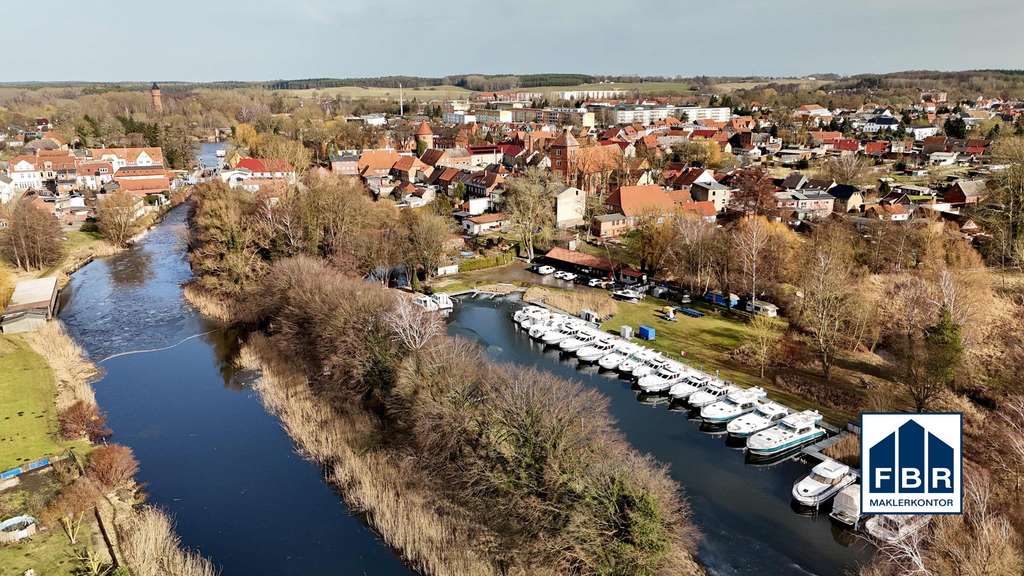 Immobilie in Lübz - Ihr bezahlbares Zuhause mit Wintergarten und Garage in Lübz - Bild 1