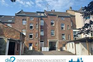 Kapitalanleger aufgepasst! 9-Parteienhaus mit Garagenhof in Eller zu verkaufen!