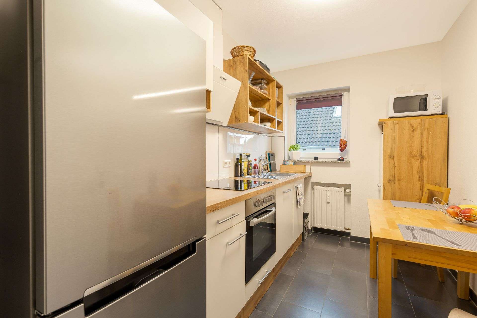 Immobilie in Schwalbach - Wohnen und Investieren: Saniertes Mehrfamilienhaus in attraktiver Feldrandlage in Schwalbach/Ts. - Bild 17