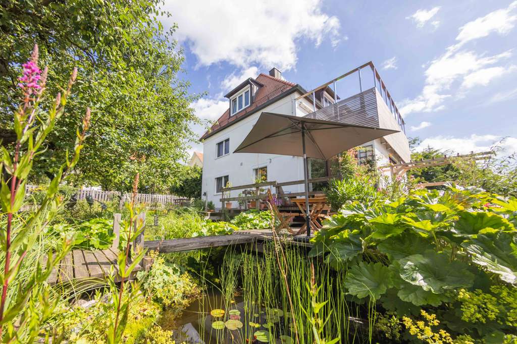 Attraktives Mehrfamilienhaus mit idyllischem Garten