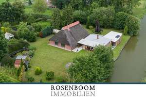 Historisches Reetdachhaus mit parkähnlichem Garten und direkter Wasserlage – Die vollständige Adresse der Immobilie erhältst du vom Anbieter., 26939 Ovelgönne – Vorschaubild 1