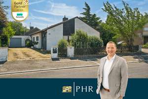 Freistehender Bungalow mit großem Wohnbereich, Garten und Potenzial für ein weiteres Zimmer