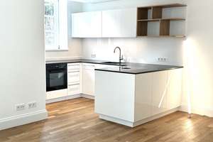 Erstbezug: 2-Zi.-Gartenwohnung in Nymphenburg-Villa | 65m², Terrasse & Garten