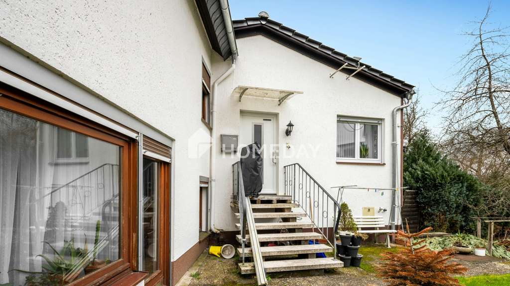 Immobilie in Waldsolms - Denkmalgeschütztes MFH mit 4 Einheiten, Garten und Stellplätzen in Waldsolms-Kröffelbach - Bild 4