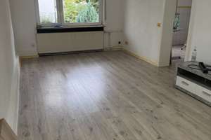 3-Zimmer-Wohnung in Hanglage – Wohnräume ebenerdig zum Garten, Kinderzimmer im Souterrain