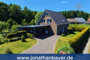 Familienidylle in Sackgassenlage – Modernes Einfamilienhaus mit Carport in ruhiger Lage