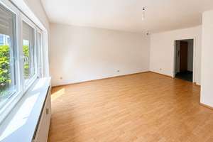 Schöne 2-Zimmer-Wohnung mit Garten, EBK und Hobbyraum