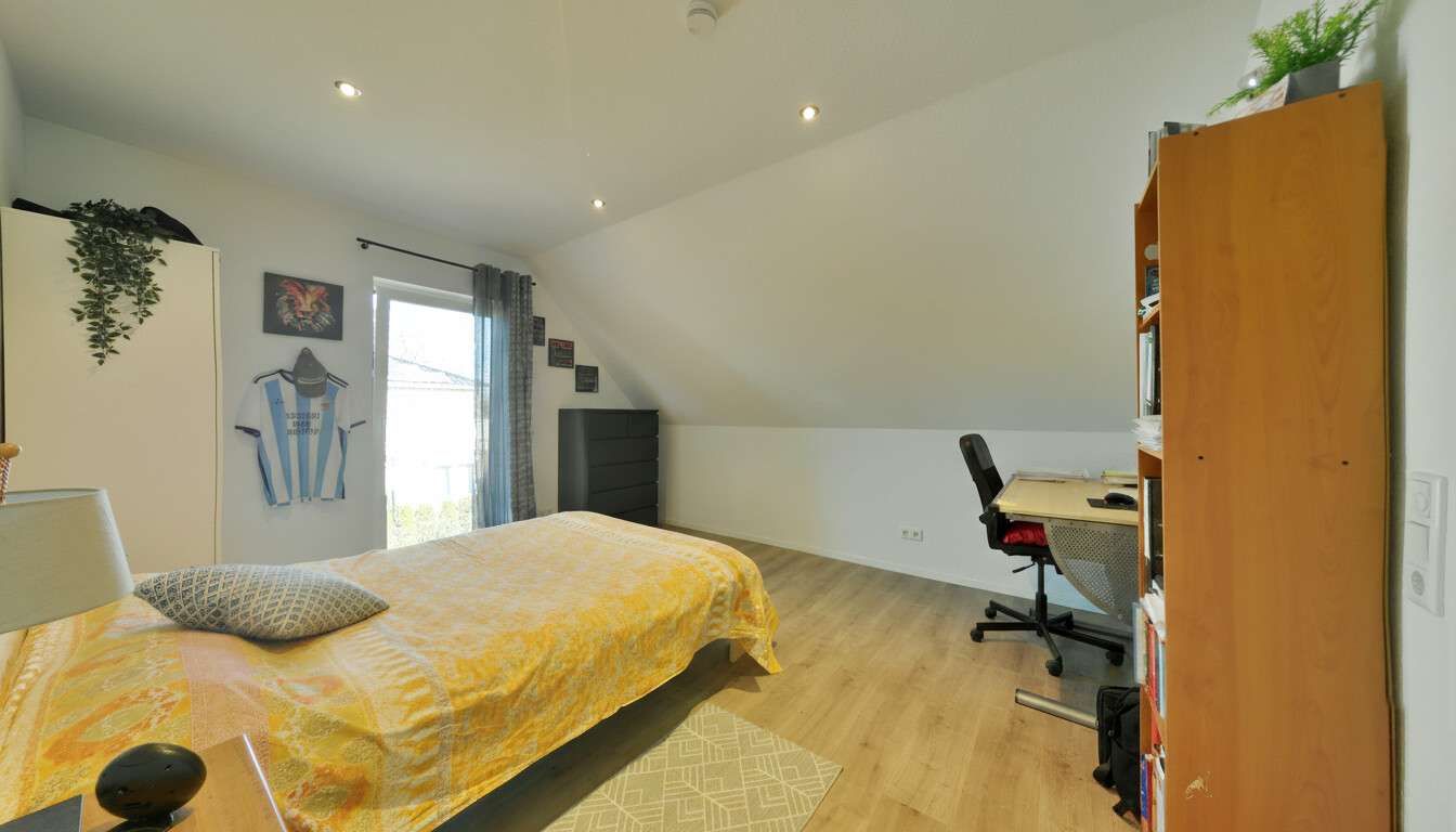 Immobilie in Dötlingen - Neuwertiges Ein-/ Zweifamilienhaus in energetischer Bauweise in Dötlingen Brettorf - Bild 9