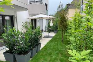 Moderne und elegante Mietwohnung mit eigenem Garten
