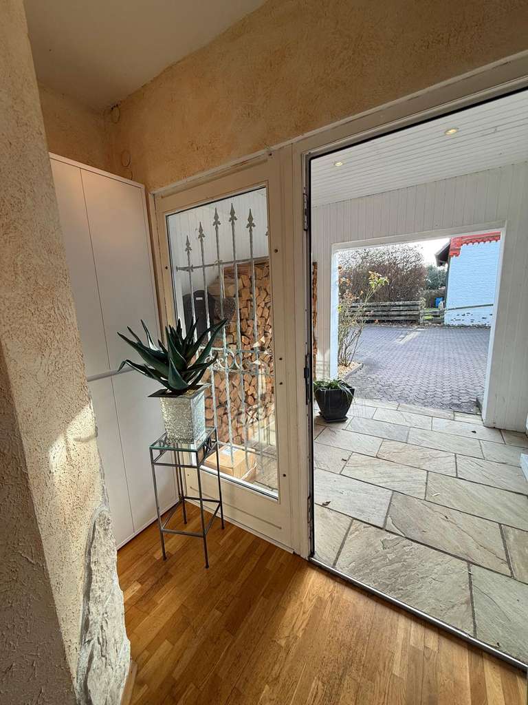 Immobilie in Neustadt am Rübenberge - Helle 3–4-Zimmer-Wohnung mit großer Dachterrasse, Kamin, Sauna und Garage in Neustadt am Rübenberge - Bild 4