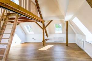 Erstbezug mit Charakter: Dachgeschoss mit Galerie & Westbalkon | KfW 55 WPB förderfähig