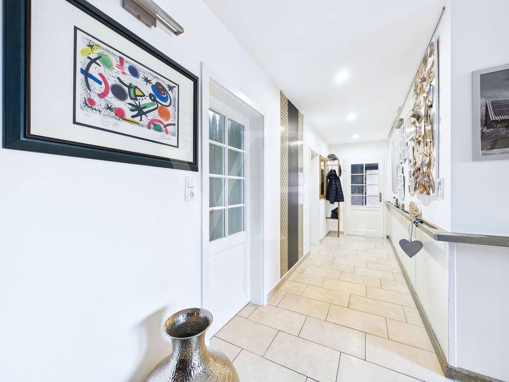 Immobilie in Wiesmoor - Großes Anwesen mit zwei Wohneinheiten in idyllischer, ruhiger Kanallage in Wiesmoor - Bild 2