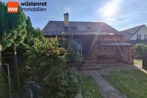 Besonderes Einfamilienhaus mit Traumgarten inklusive Außenpool in exklusiver Wohnlage zu verkaufen !