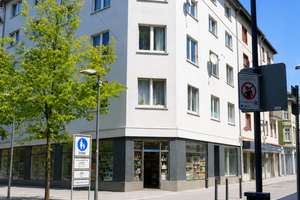 Wohn- und Geschäftshaus im Offenbacher Zentrum – 10 Wohnungen, 4 Läden, 6,1 % Rendite, Faktor 16,48