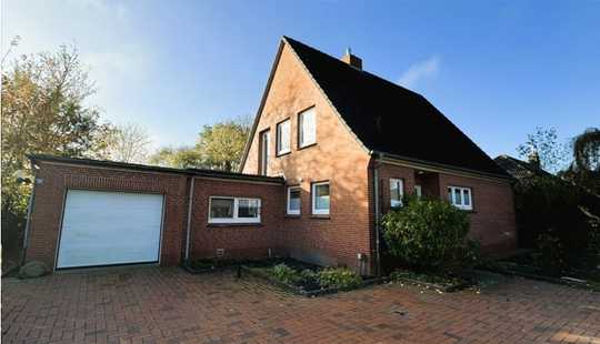 Bild von Zentrumsnähe garantiert!
Sehr gepflegtes Einfamilienhaus mit Garage und großzügigem Garten
