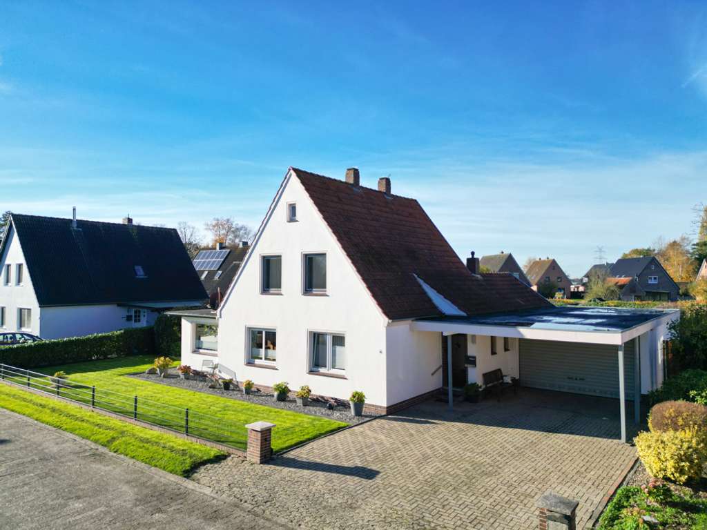 Immobilie in Ovelgönne - Wohnglück im Grünen – Charmantes Zuhause auf großzügigem Grundstück in Ovelgönne! - Bild 1