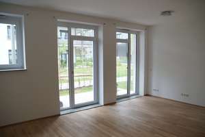 Moderne 2,5-Zimmer-Wohnung mit Gartenterrasse, EBK und Tiefgarage (E-Auto!)