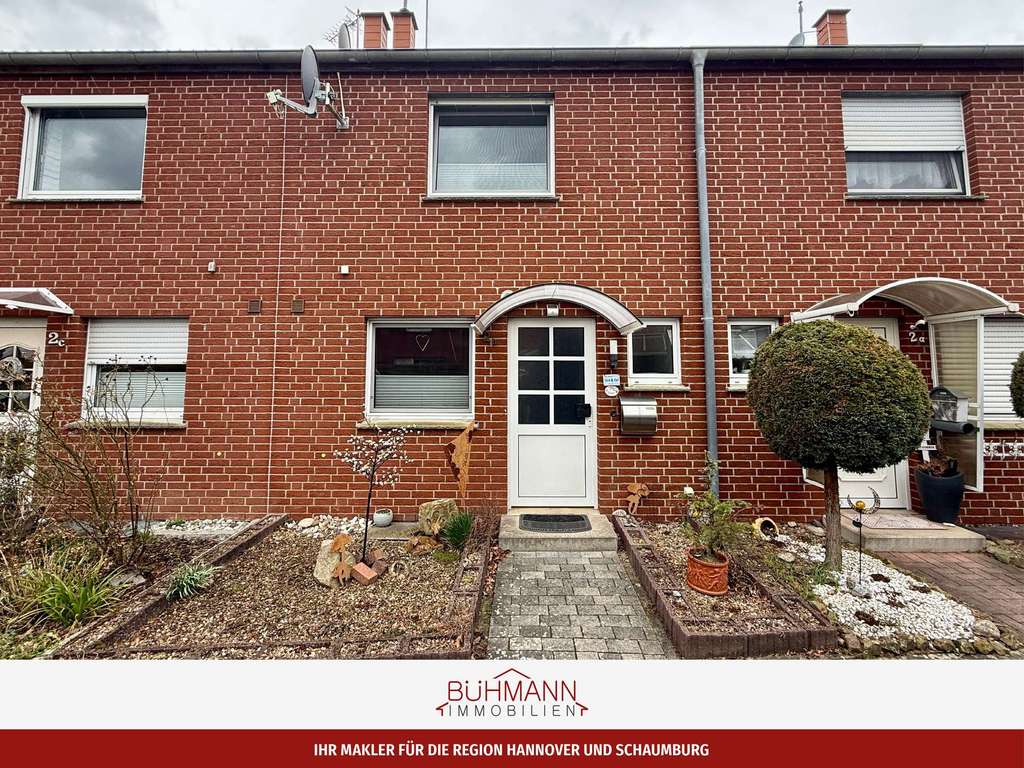 Immobilie in Sachsenhagen - 31553 Sachsenhagen – Reihenmittelhaus mit Garage und Grundstück - Bild 0