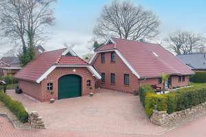Hochwertiges Einfamilienhaus in begehrter Siedlungslage von Remels – Die vollständige Adresse der Immobilie erhältst du vom Anbieter., 26670 Uplengen – Vorschaubild 1