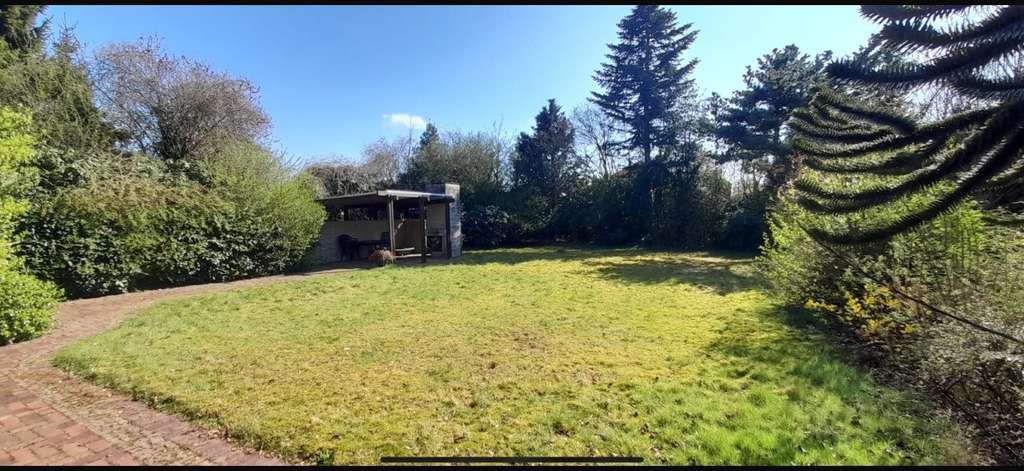 Immobilie in Zetel - Refugium der Extraklasse: geschmackvoller Bungalow m. Wellness-Oase u. parkähnlichem Garten in Zetel - Bild 0