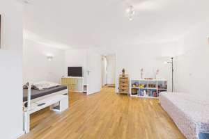 HEGERICH: Vermietete 1,5-Zimmer-Erdgeschosswohnung mit Balkon in München-Bogenhausen!