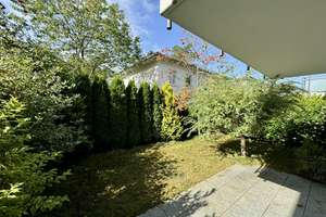 Neuwertige 2-Zi.-Gartenwohnung mit Einbauküche u. TG in Waldtrudering